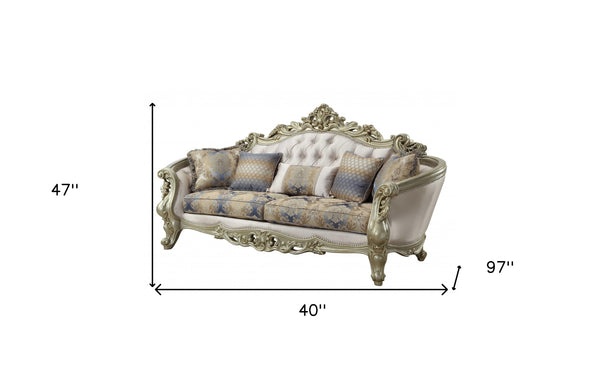 Homeroots 40" Antiqued White Velvet Curved Floral Sofa And Toss Pillows With Champagne Legs   348231