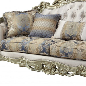 Homeroots 40" Antiqued White Velvet Curved Floral Sofa And Toss Pillows With Champagne Legs   348231