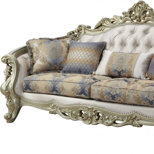 Homeroots 40" Antiqued White Velvet Curved Floral Sofa And Toss Pillows With Champagne Legs   348231