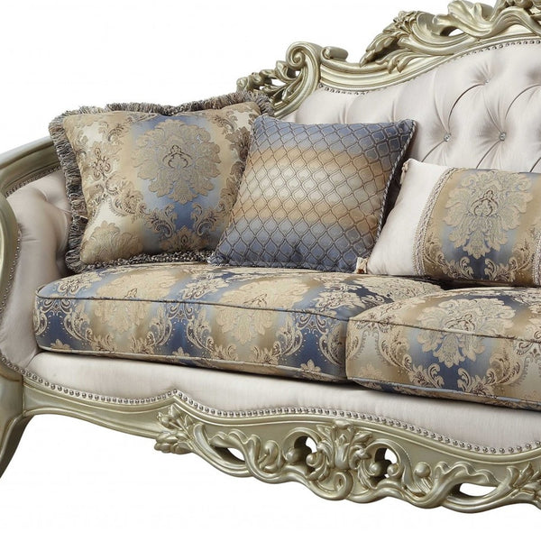 Homeroots 40" Antiqued White Velvet Curved Floral Sofa And Toss Pillows With Champagne Legs   348231