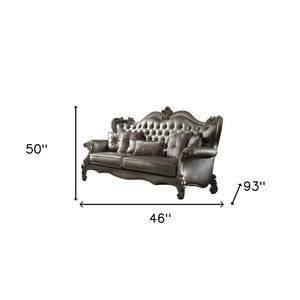 Homeroots 46" Platinum Faux Leather Curved Sofa And Toss Pillows   348644