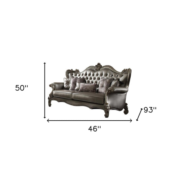 Homeroots 46" Platinum Faux Leather Curved Sofa And Toss Pillows   348644