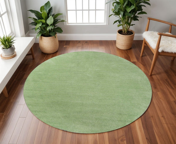 HomeRoots 8' Green Round Hand-Woven Area Rug - Artisan Crafted, Versatile Design for Living Spaces & Dining Rooms 8' Round 349768