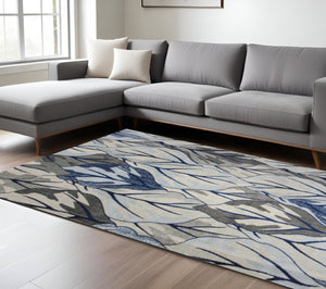HomeRoots 8' Gray and Navy Blue Botanical Leaves Area Rug - Stylish, Durable, and Perfect for Any Room Decor 8' X 11' 349844