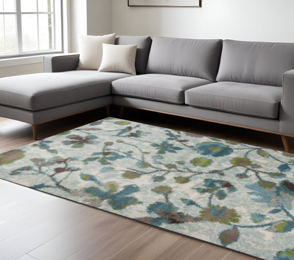 HomeRoots 8' Vibrant Teal Blue Floral Vines Area Rug - Durable, Stain-Resistant, Perfect for Homes with Kids & Pets 8' X 11' 349848