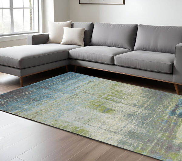 HomeRoots 7' Modern Abstract Area Rug in Blue and Green - Soft, Durable, Stain-Resistant for High-Traffic Areas 7' X 10' 349860