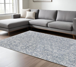HomeRoots 8' Slate Blue and Ivory Abstract Hand-Woven Round Rug - Modern Elegance for Any Living Space 8' X 10' 349877