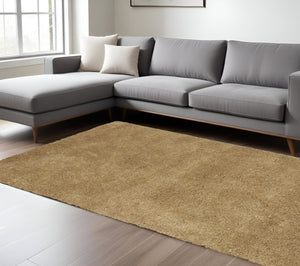 HomeRoots 8' Gold Hand-Woven Round Rug - Elevate Your Space with Unique Artistry, Comfort, and Timeless Style 8' X 10' 349886