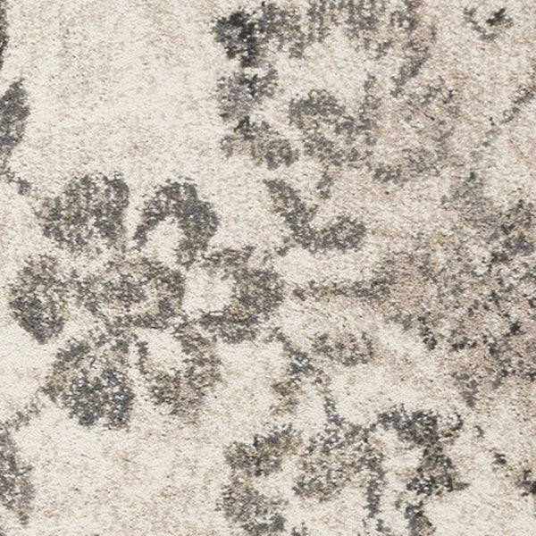HomeRoots 8' Gray and Tan Floral Distressed Area Rug - Timeless Vintage Style for High-Traffic Family Spaces 8' X 10' 350055