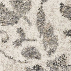 HomeRoots 8' Gray and Tan Floral Distressed Area Rug - Timeless Vintage Style for High-Traffic Family Spaces 8' X 10' 350055