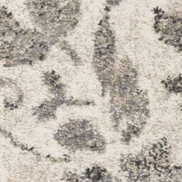 HomeRoots 8' Gray and Tan Floral Distressed Area Rug - Timeless Vintage Style for High-Traffic Family Spaces 8' X 10' 350055