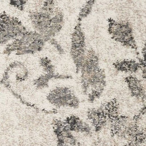 HomeRoots 8' Gray and Tan Floral Distressed Area Rug - Timeless Vintage Style for High-Traffic Family Spaces 8' X 10' 350055