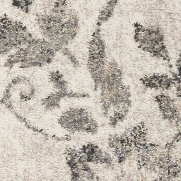 HomeRoots 8' Gray and Tan Floral Distressed Area Rug - Timeless Vintage Style for High-Traffic Family Spaces 8' X 10' 350055