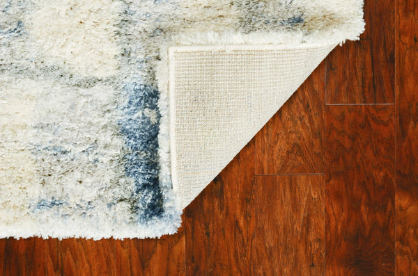 HomeRoots 9' Ivory and Blue Abstract Geometric Area Rug – Modern Elegance for Large Spaces, Durable Comfort 9' X 13' 350105