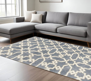 HomeRoots 7' Slate Blue and Ivory Geometric Area Rug – Modern Elegance for Cozy Living Spaces and Style 7' X 10' 350187