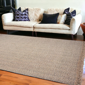 Homeroots 9' X 12' Oatmeal Beige Hand Woven Herringbone With Braided Fringe Indoor Area Rug  Wool 350266