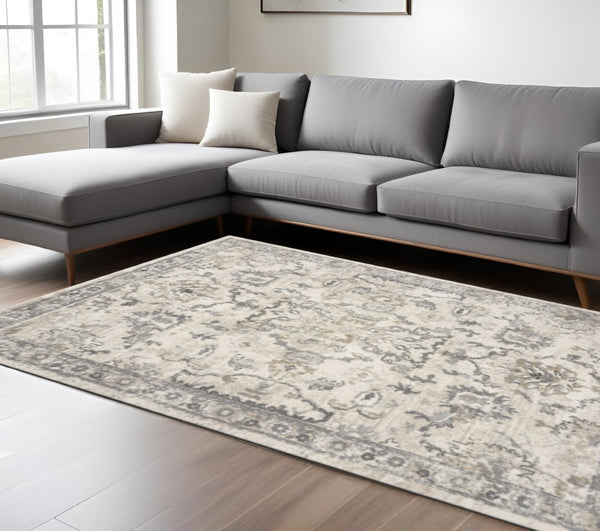 HomeRoots 9' Floral Medallion Distressed Area Rug in Ivory & Gray – Timeless Elegance for Any Space 9' X 13' 350269