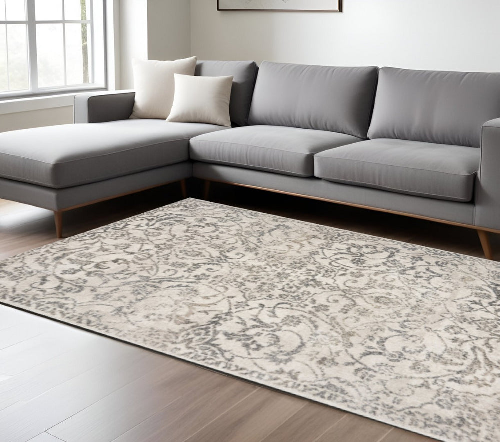 HomeRoots 9' Ivory and Brown Floral Medallion Area Rug - Vintage Charm, Durable Design for Busy Homes 9' X 13' 350271