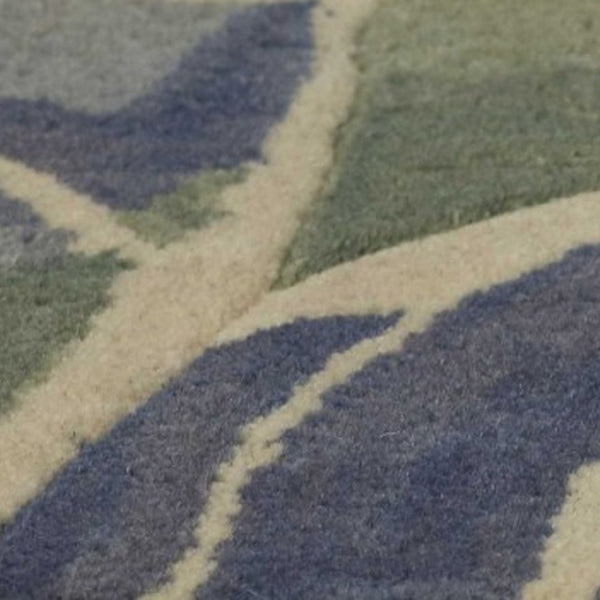 HomeRoots 5' Tropical Botanical Wool Area Rug in Blue Green Beige – Hand-Tufted, Stylish Comfort for Your Home 7' X 9' 350311