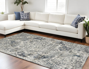 Homeroots 9' X 13' Ivory Machine Woven Distressed Diamond Floral Medallion Indoor Area Rug  Polyester 350332