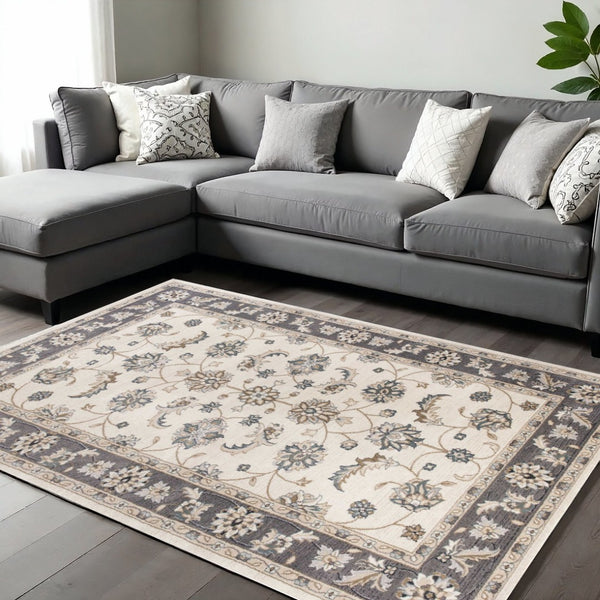 HomeRoots 9' Gray and Ivory Floral Medallion Area Rug - Timeless Elegance for High-Traffic Living Spaces 9' X 12' 350368