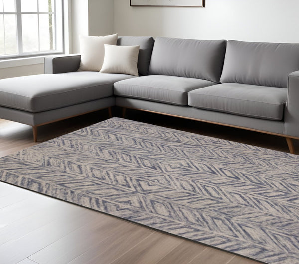 HomeRoots 9' Hand-Tufted Wool Chevron Area Rug in Blue and Beige - Stylish Comfort for Modern Living Spaces 9' X 12' 350503