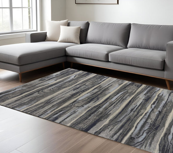 HomeRoots 10' Modern Abstract Area Rug in Gray, Blue, and Black - Soft, Durable, and Stain-Resistant Design 10' X 13' 350522