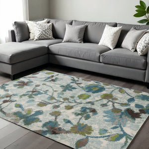 HomeRoots 10' Contemporary Teal Blue Floral Vines Area Rug – Durable, Soft, Stain-Resistant for Modern Homes 10' X 13' 350531