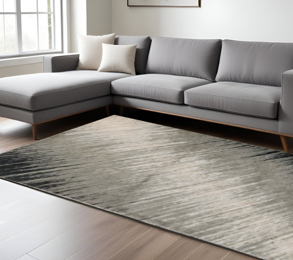 HomeRoots 9' Modern Silver and Gray Abstract Area Rug - Durable, Low-Pile Design Ideal for High-Traffic Spaces 9' X 13' 350572
