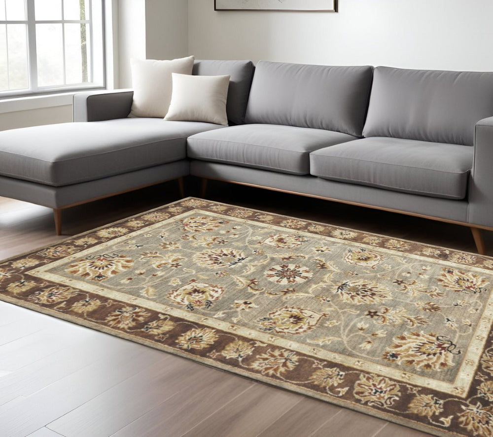 HomeRoots 9' Hand-Tufted New Zealand Lambs Wool Area Rug with Floral Medallion Design for Elegant Spaces 9' X 13' 350603