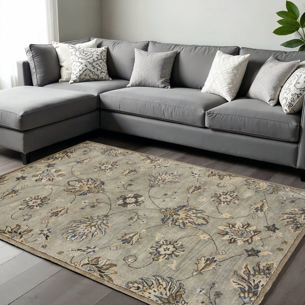 HomeRoots 9' Hand-Tufted Wool Floral Area Rug for Timeless Elegance and Warmth in Large Living Spaces 9' X 13' 350611