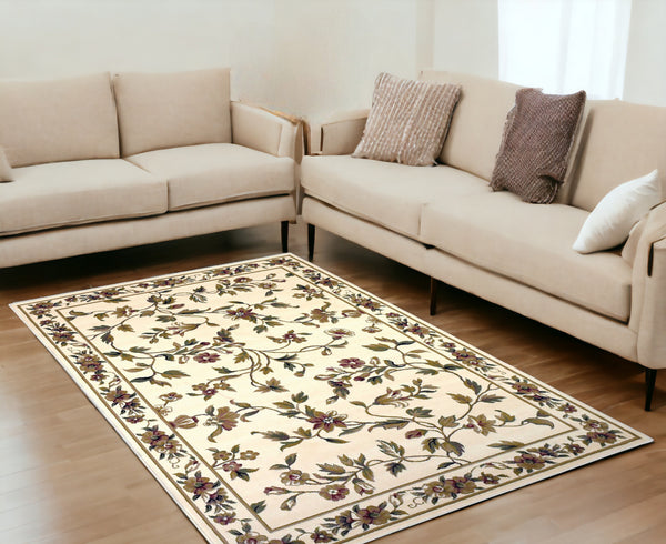 Homeroots 5' X 8' Ivory Floral Vine Bordered Area Rug  Polypropylene 352427