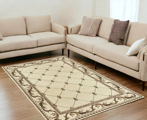 Homeroots 5' X 8' Ivory Machine Woven Hand Carved Fleur De Lis Indoor Area Rug  Polypropylene 352467