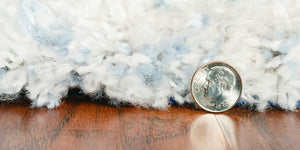 HomeRoots 5' Ivory and Blue Abstract Area Rug - Contemporary Artistry, Durable Performance for Any Space 5" x 8" 352490