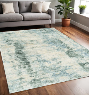 HomeRoots 5' Stylish Ivory and Blue Abstract Area Rug - Modern Elegance, Durable, Easy Care for Busy Homes 5" x 8" 352492