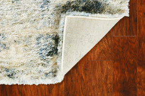 HomeRoots 5' Stylish Ivory and Blue Abstract Area Rug - Modern Elegance, Durable, Easy Care for Busy Homes 5" x 8" 352492