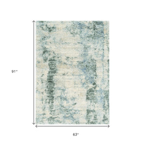 HomeRoots 5' Stylish Ivory and Blue Abstract Area Rug - Modern Elegance, Durable, Easy Care for Busy Homes 5" x 8" 352492