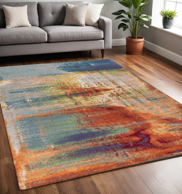 HomeRoots 8' Blue, Rust, and Orange Abstract Area Rug - Modern Design for Durable Living Room Style and Comfort 5' X 8' 352506