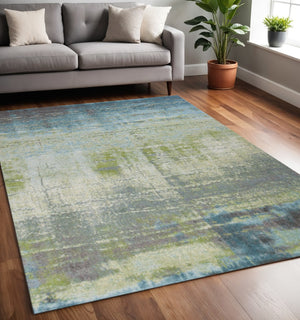 HomeRoots 7' Modern Abstract Area Rug in Blue and Green - Soft, Durable, Stain-Resistant for High-Traffic Areas 5' X 8' 352507