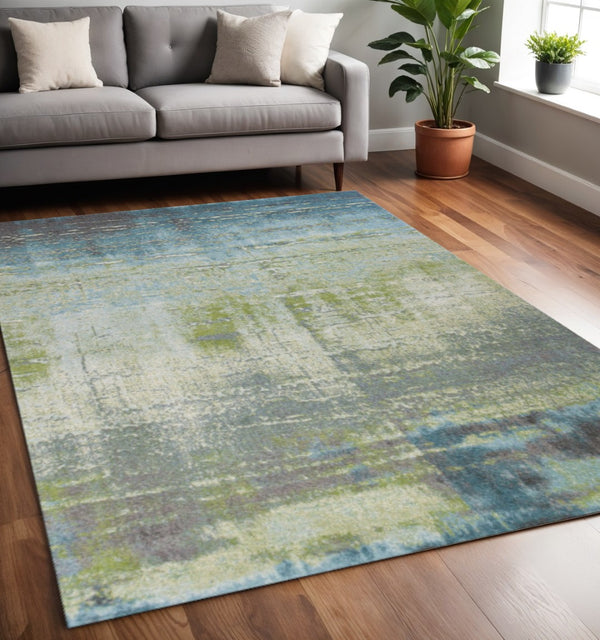 HomeRoots 7' Modern Abstract Area Rug in Blue and Green - Soft, Durable, Stain-Resistant for High-Traffic Areas 5' X 8' 352507