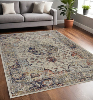 HomeRoots 5' Traditional Medallion Area Rug in Ivory with Blue and Orange Accents for Timeless Elegance 5' X 8' 352579
