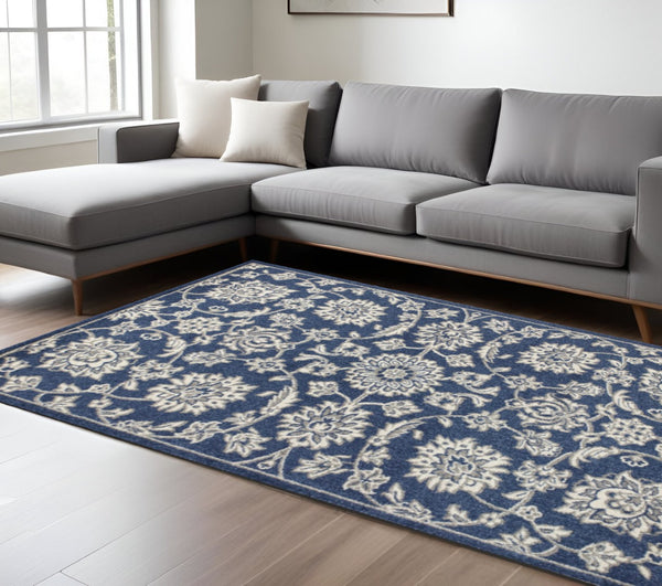 HomeRoots 7' Elegant Blue and Ivory Floral Medallion Area Rug - Durable, Stain-Resistant, Low-Maintenance Design 7' X 9' 352598
