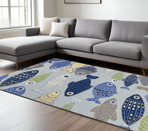HomeRoots 5' Hand-Hooked Area Rug with Blue, Ivory, and Green Fish Motif – Durable, Stain Resistant, Artful Charm 5' X 7' 352605