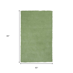 HomeRoots 8' Green Round Hand-Woven Area Rug - Artisan Crafted, Versatile Design for Living Spaces & Dining Rooms 5' X 7' 352641
