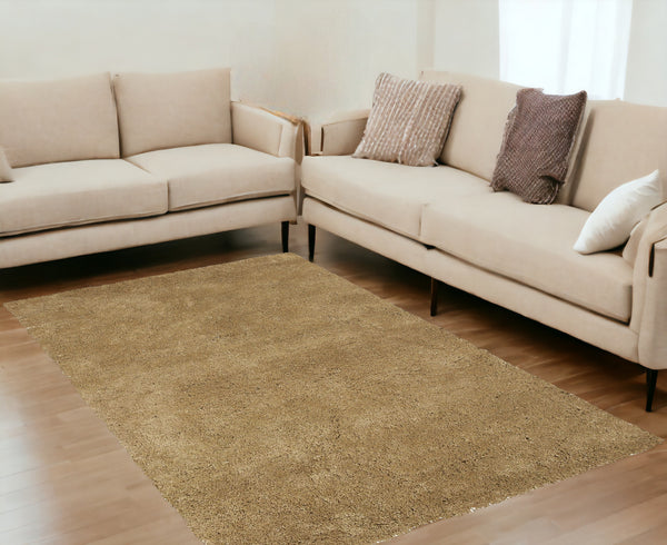 Homeroots 5' X 7' Gold Plain Indoor Area Rug  Polyester 352658