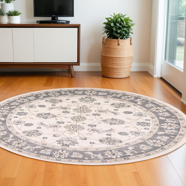 Homeroots 8' Ivory Grey Floral Round Indoor Area Rug  Polypropylene 352689