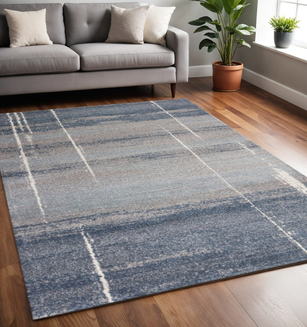HomeRoots 5' Modern Blue and Gray Abstract Area Rug - Stylish, Stain-Resistant, Durable Design for Any Room 5' X 8' 352693