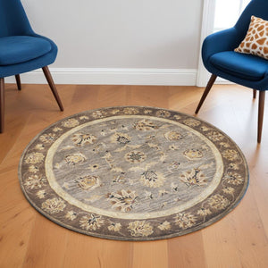 HomeRoots 8' Timeless Gray Brown Ivory Floral Medallion Hand-Tufted Area Rug in New Zealand Lambs Wool 6' Round 352887