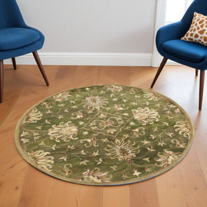 HomeRoots 8' Hand-Tufted Wool Area Rug with Elegant Floral Medallion Design in Rich Green, Red & Ivory Tones 5' Round 352893