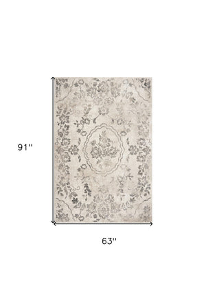 HomeRoots 8' Gray and Tan Floral Distressed Area Rug - Timeless Vintage Style for High-Traffic Family Spaces 5' X 8' 352929